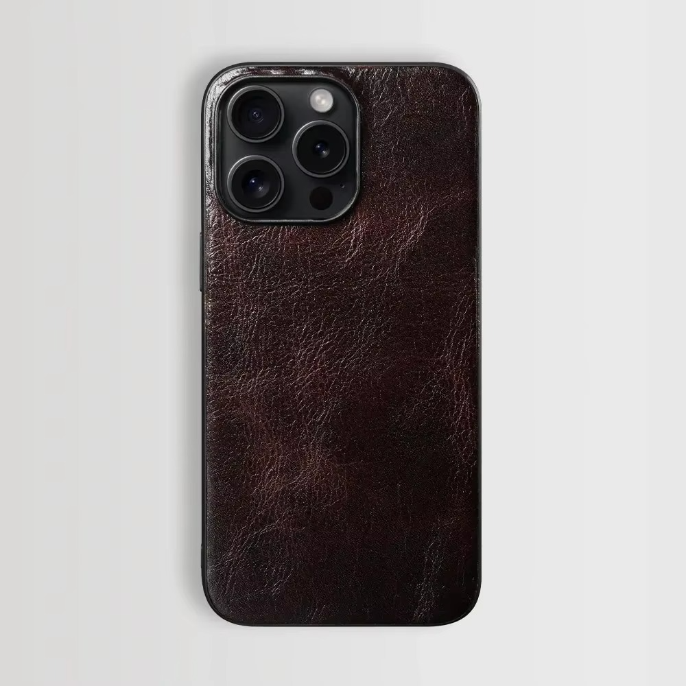 Luxury iPhone Case — Genuine Cowhide Leather Back Cover with Retro Vintage Design, Shockproof PC Protection and Raised Camera Lips