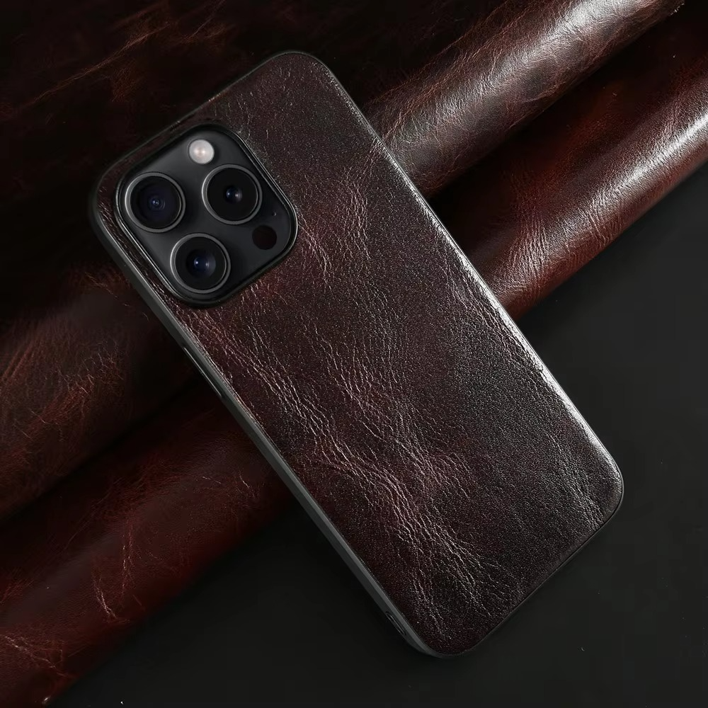 Luxury iPhone Case — Genuine Cowhide Leather Back Cover with Retro Vintage Design, Shockproof PC Protection and Raised Camera Lips