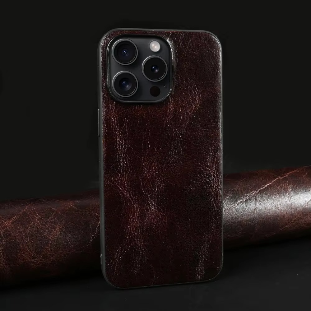 Luxury iPhone Case — Genuine Cowhide Leather Back Cover with Retro Vintage Design, Shockproof PC Protection and Raised Camera Lips