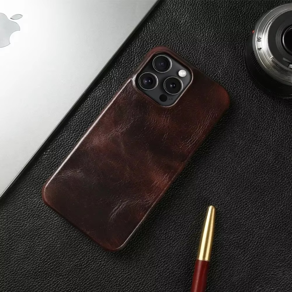 Luxury iPhone Case — Genuine Cowhide Leather Back Cover with Retro Vintage Design, Shockproof PC Protection and Raised Camera Lips