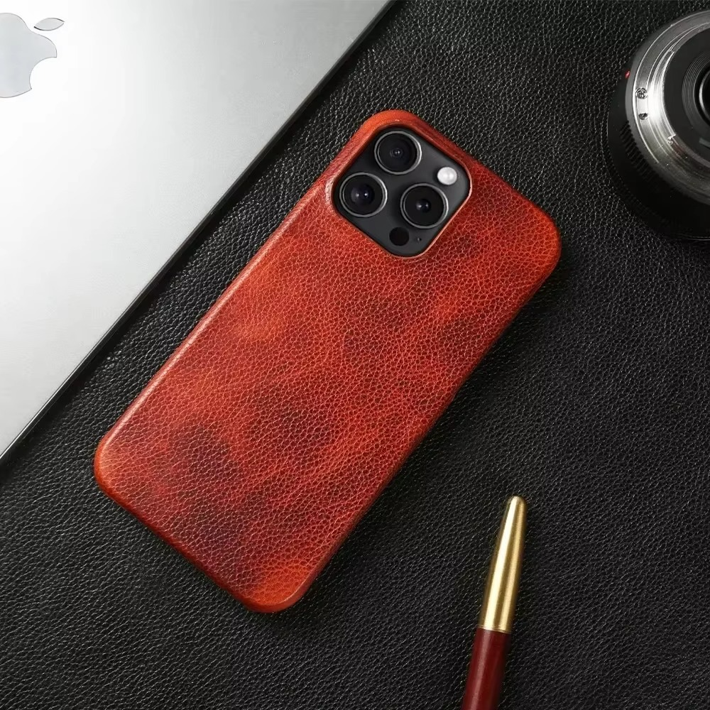 Luxury iPhone Case — Genuine Cowhide Leather Back Cover with Retro Vintage Design, Shockproof PC Protection and Raised Camera Lips